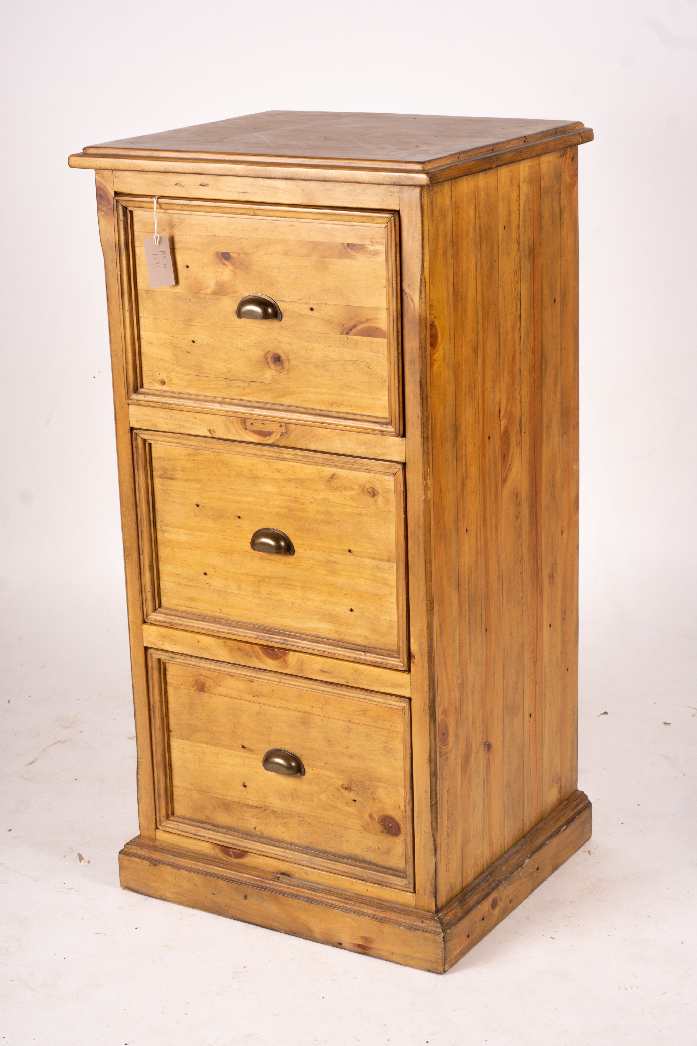 A reproduction pine kneehole desk, width 174cm, depth 79cm, height 86cm together with a matching pine three drawer filing cabinet